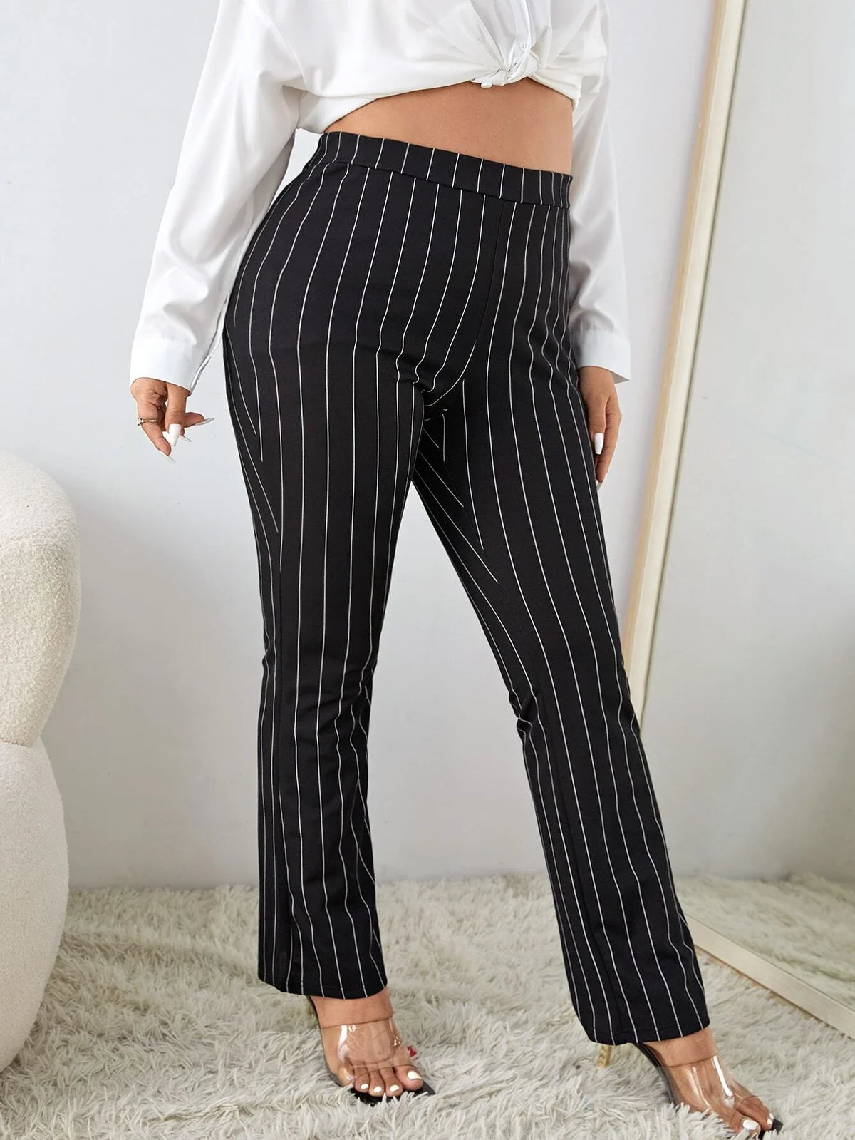 Pantaloni a gamba tagliata vita alta a righe verticali